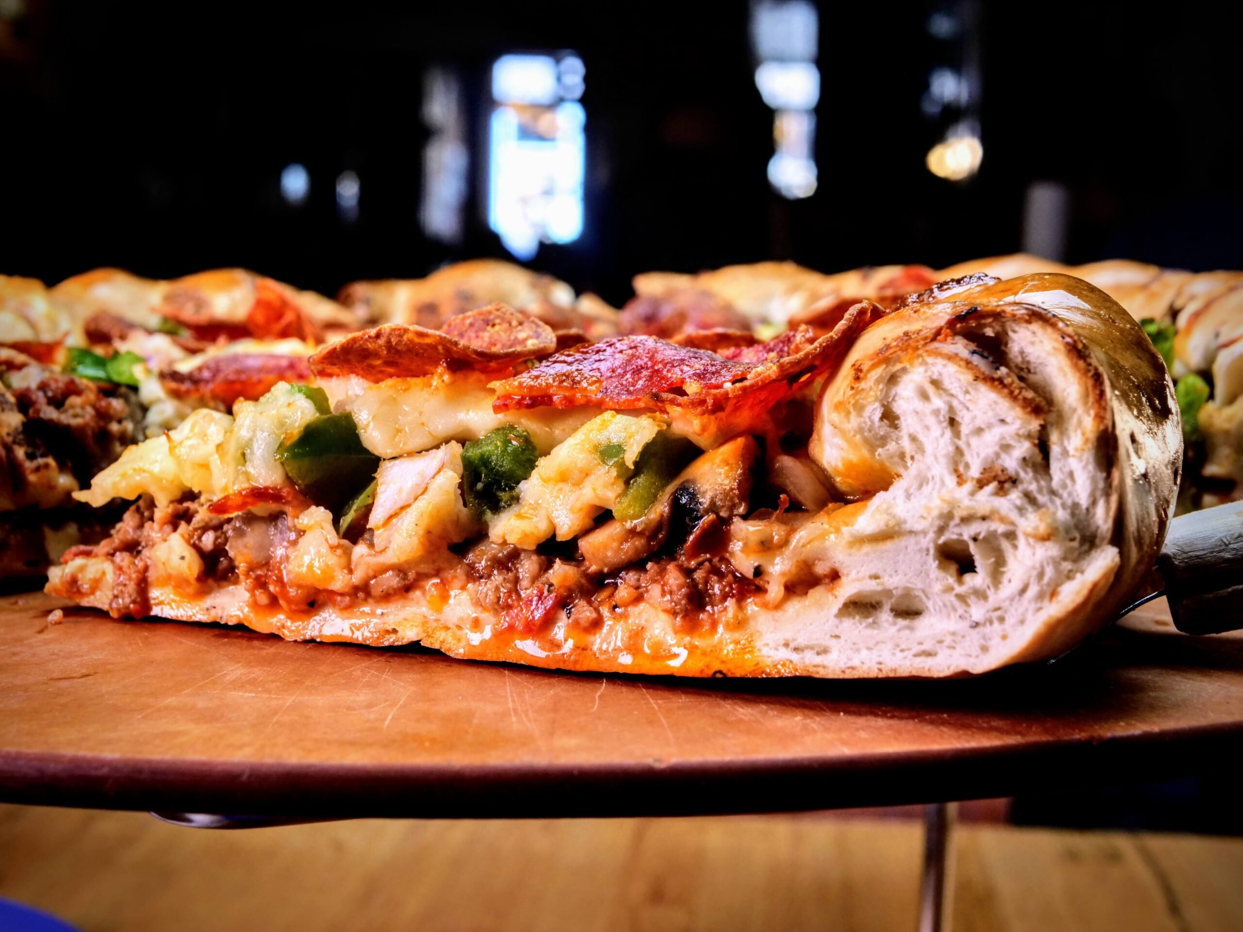 A thick slice of colorado-style pizza from Beau Jo's.
